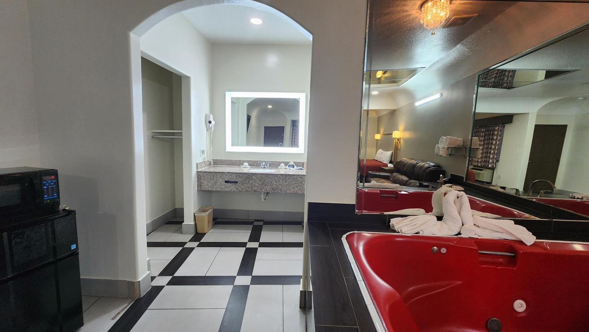 Scottish Inn & Suites Sam Houston Parkway Dış mekan fotoğraf