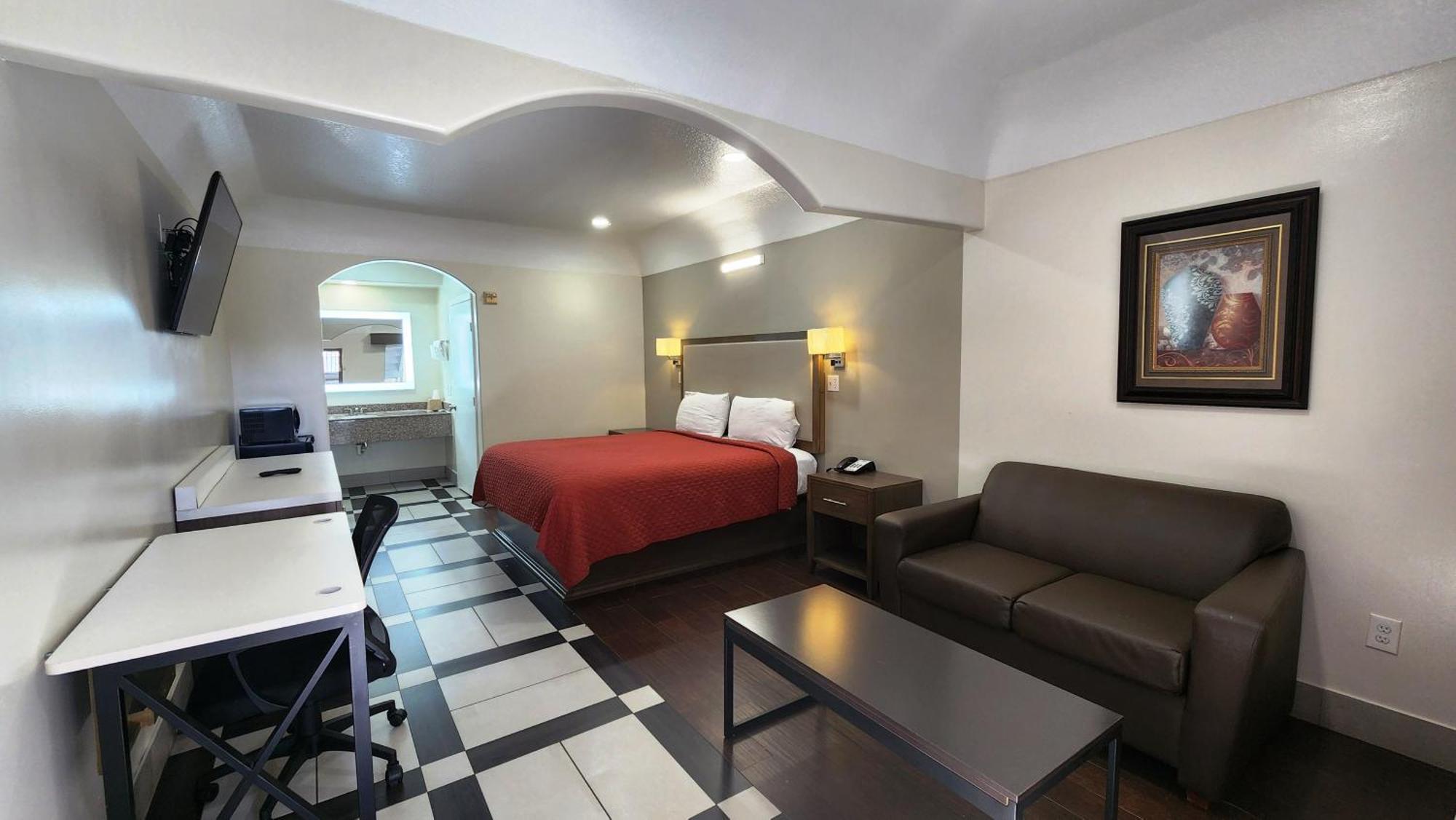 Scottish Inn & Suites Sam Houston Parkway Dış mekan fotoğraf