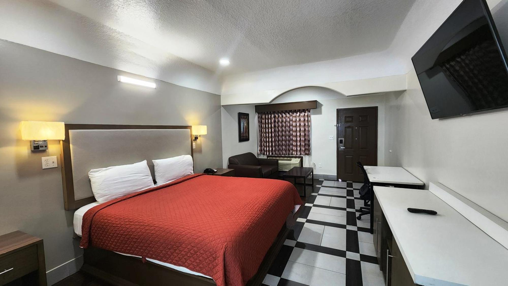 Scottish Inn & Suites Sam Houston Parkway Dış mekan fotoğraf